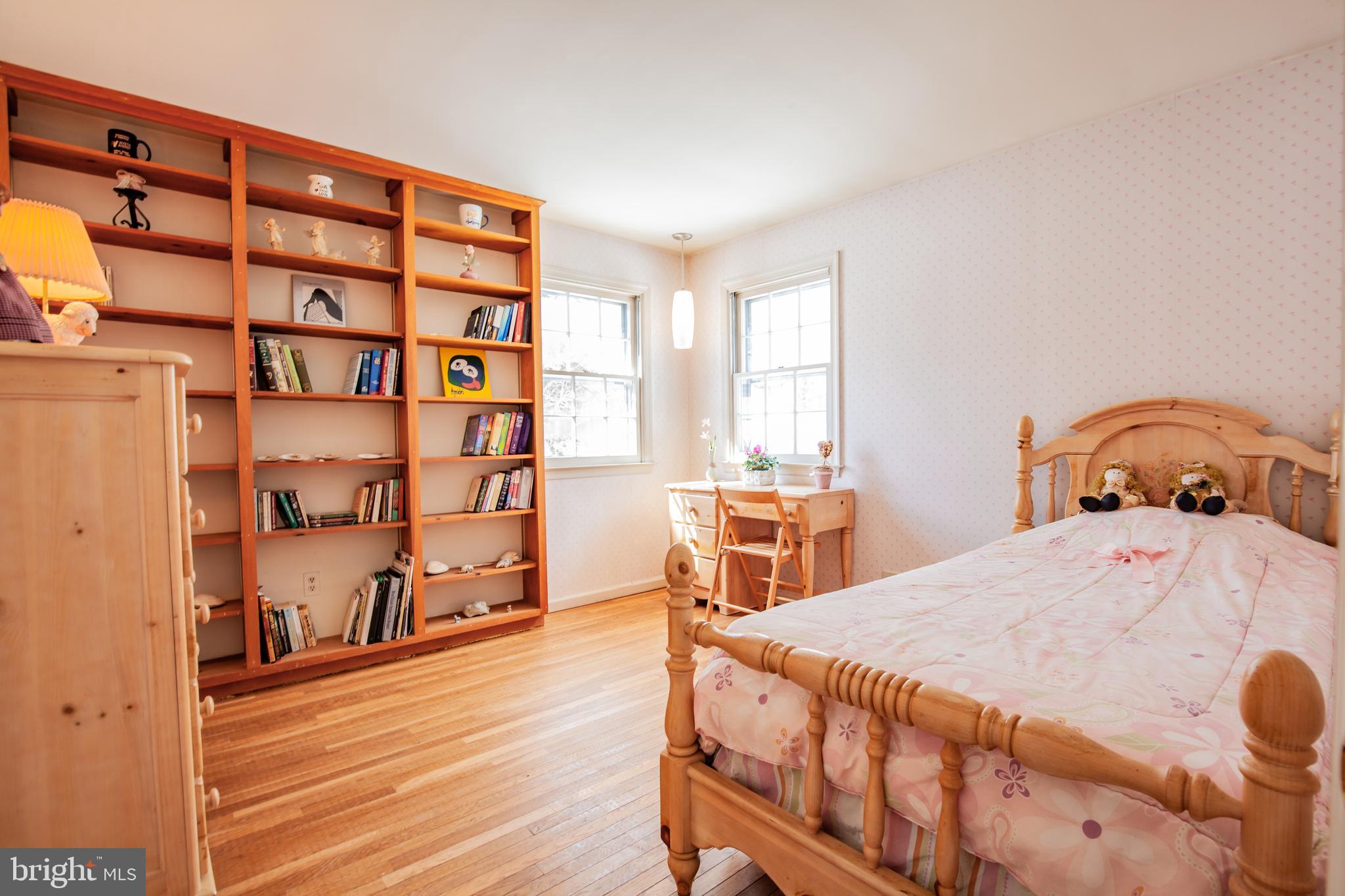 771 Richards Road Wayne, PA 19087 - Photo 29 of 41 a bedroom with a bed and a wooden floor