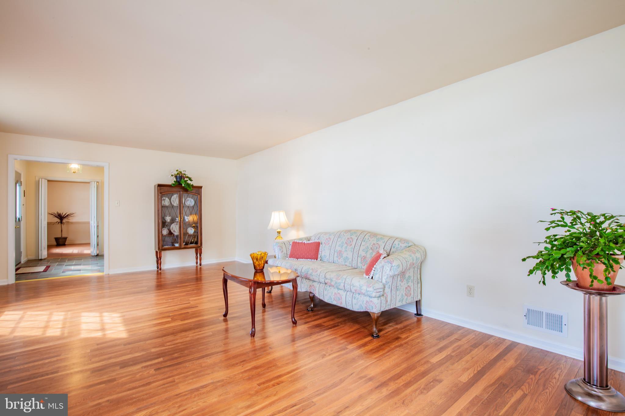 771 Richards Road Wayne, PA 19087 - Photo 8 of 41 a living room with furniture and a potted plant