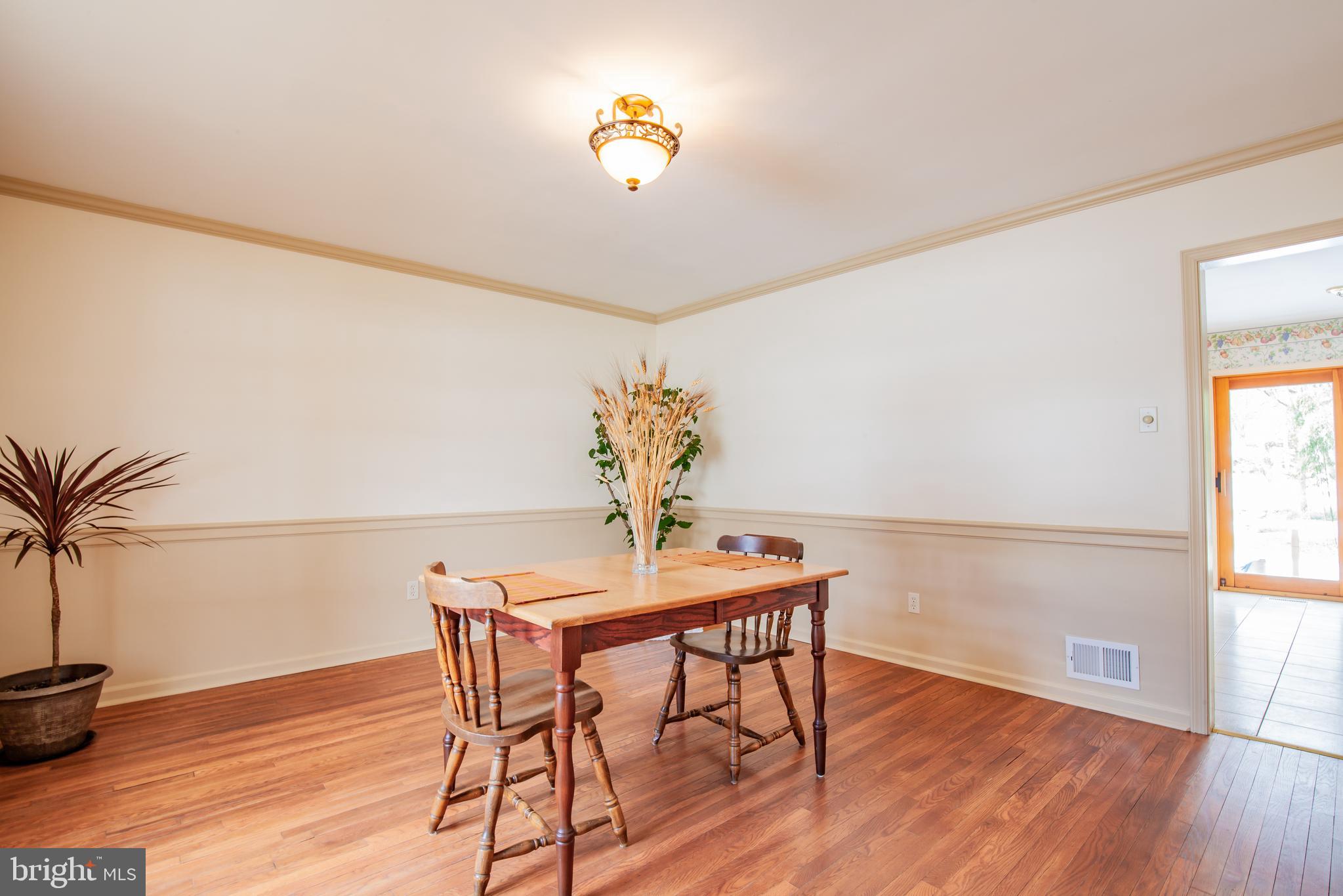 771 Richards Road Wayne, PA 19087 - Photo 9 of 41 a dining room with furniture and wooden floor