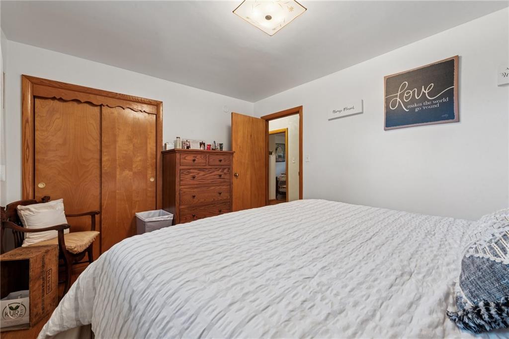 234 Ankney Hl Road Acme, PA 15610 - Photo 14 of 47 a bedroom with a bed and a dresser