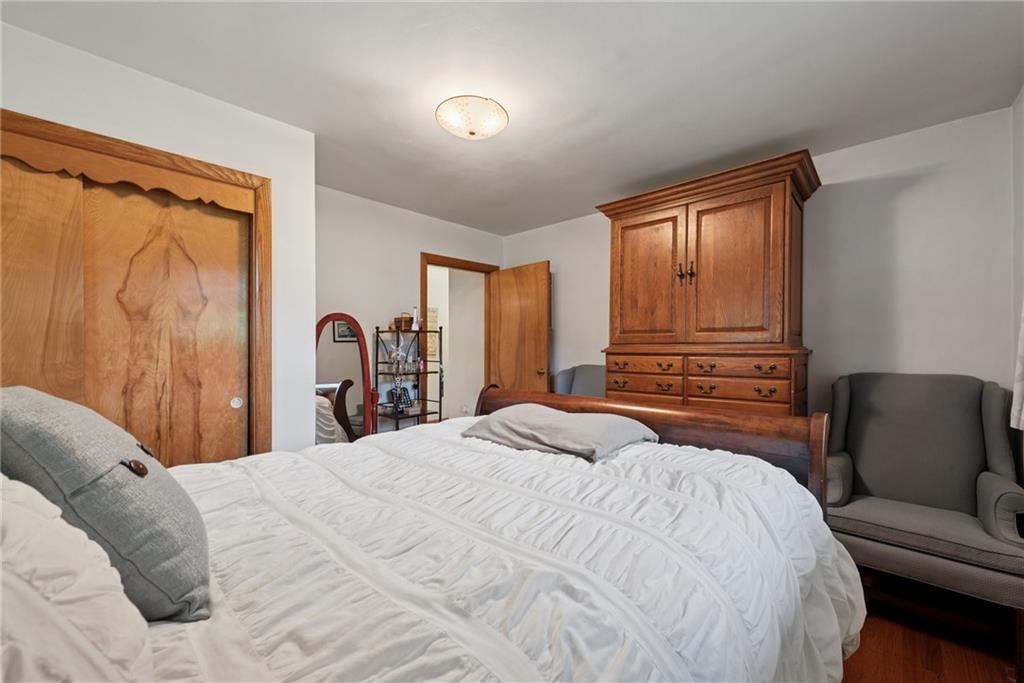 234 Ankney Hl Road Acme, PA 15610 - Photo 17 of 47 a bedroom with a bed and a couch