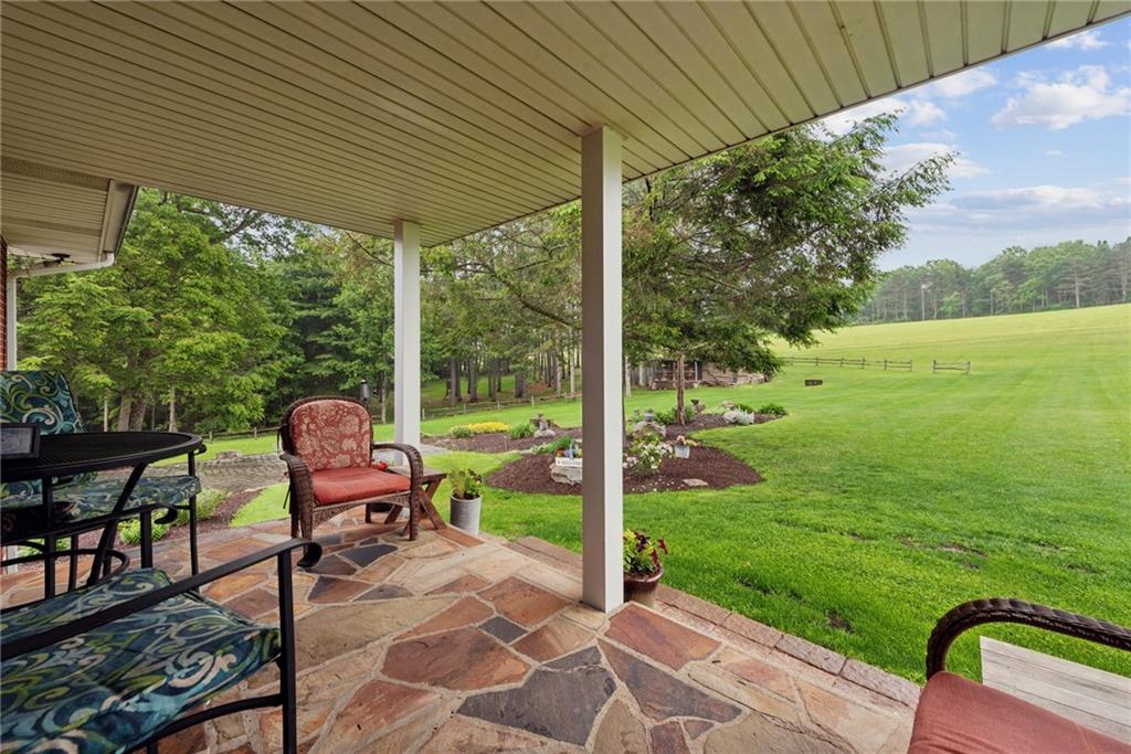 234 Ankney Hl Road Acme, PA 15610 - Photo 21 of 47 a view of a patio with garden