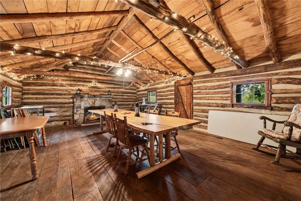 234 Ankney Hl Road Acme, PA 15610 - Photo 24 of 47 a dining room with furniture and wooden floor