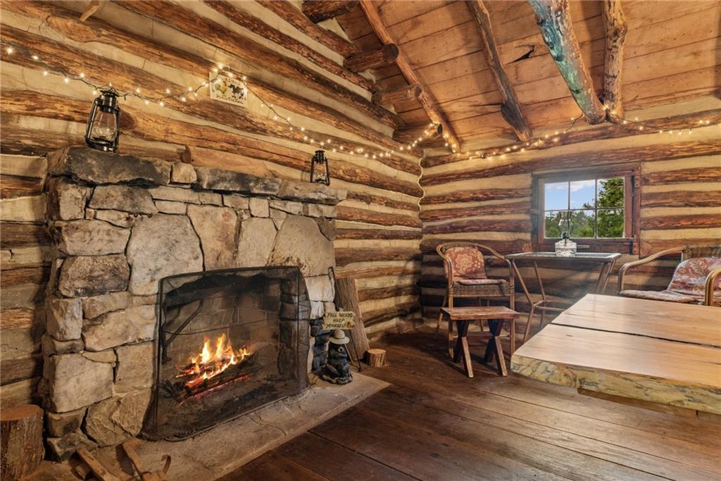 234 Ankney Hl Road Acme, PA 15610 - Photo 26 of 47 a living room with lots of furniture and a flat screen tv