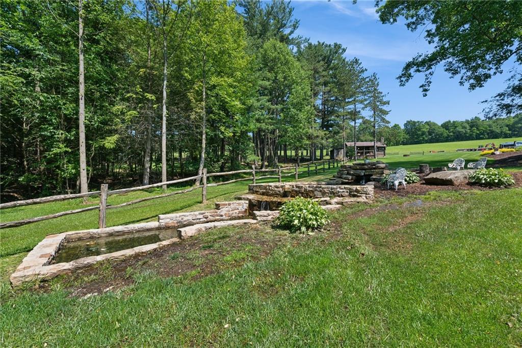 234 Ankney Hl Road Acme, PA 15610 - Photo 30 of 47 a view of a park with swings