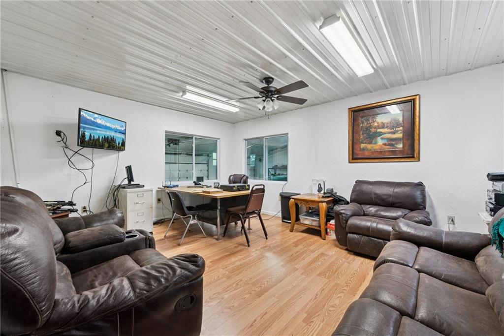 234 Ankney Hl Road Acme, PA 15610 - Photo 34 of 47 a living room with furniture and a flat screen tv