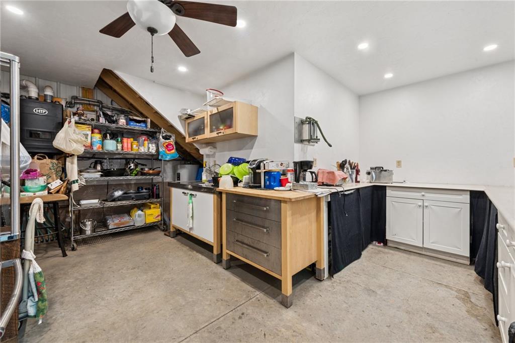 234 Ankney Hl Road Acme, PA 15610 - Photo 36 of 47 a kitchen with stainless steel appliances granite countertop a sink and cabinets