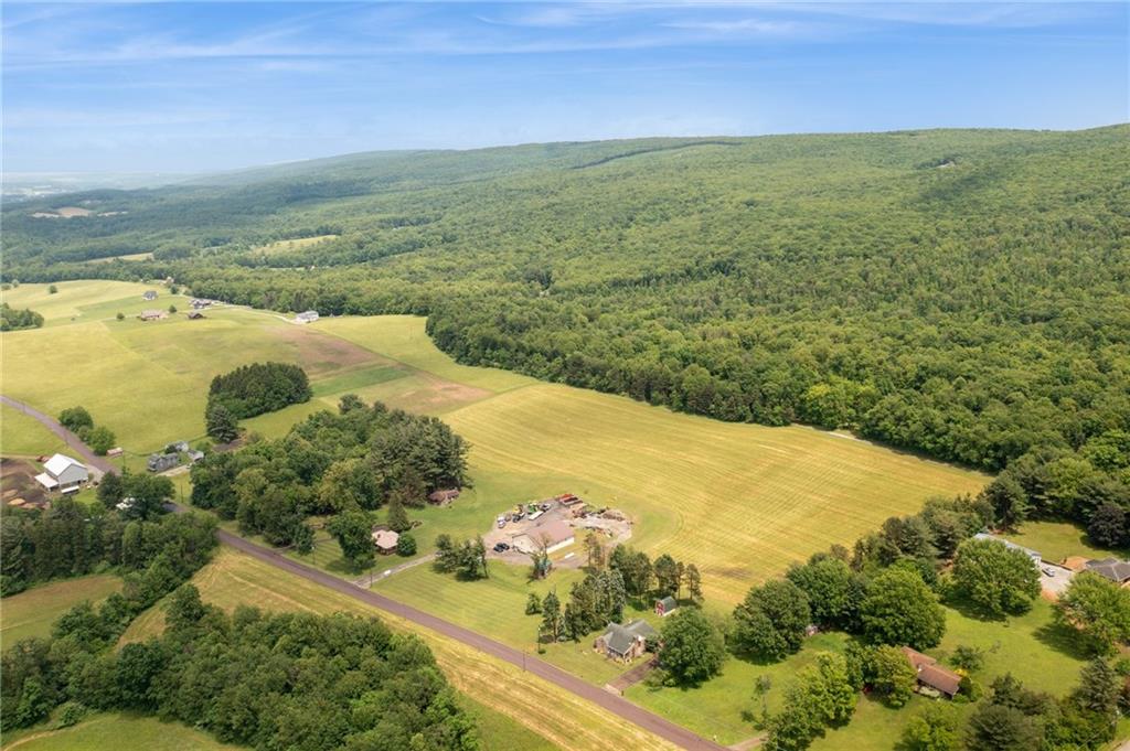 234 Ankney Hl Road Acme, PA 15610 - Photo 46 of 47 a view of a lake with a yard