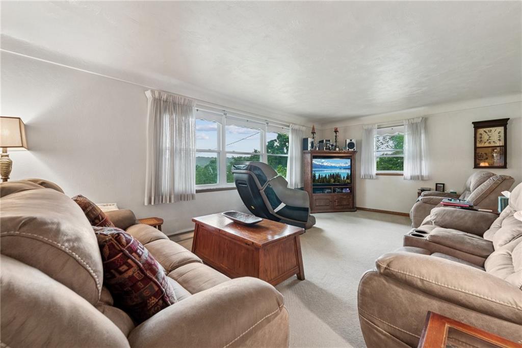 234 Ankney Hl Road Acme, PA 15610 - Photo 6 of 47 a living room with furniture and a fireplace