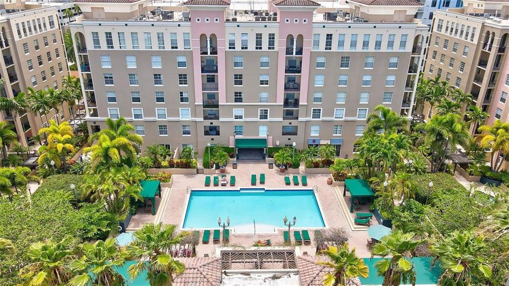 520 Southeast 5th Avenue, Unit 1502 Fort Lauderdale, FL 33301 - Photo 1 of 17 a view of a tall building next to a yard