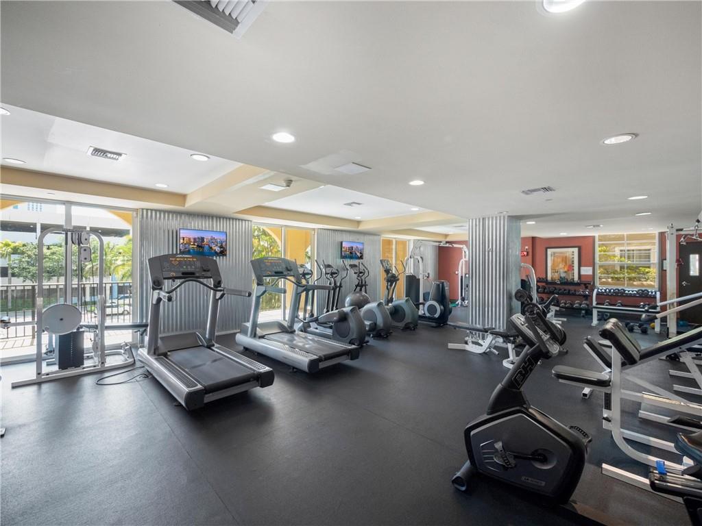 520 Southeast 5th Avenue, Unit 1502 Fort Lauderdale, FL 33301 - Photo 15 of 17 a view of a room with gym equipment