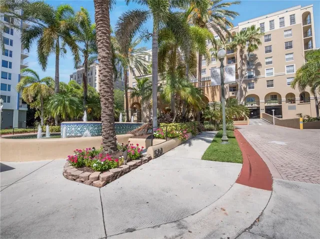 a view of multiple house with a yard