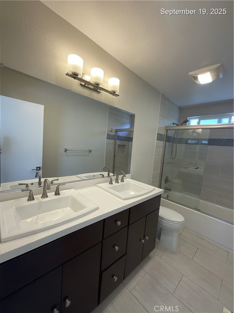 34021 Granada Drive, Unit B Dana Point, CA 92629 - Photo 19 of 23 a bathroom with a sink double vanity granite tub and a mirror