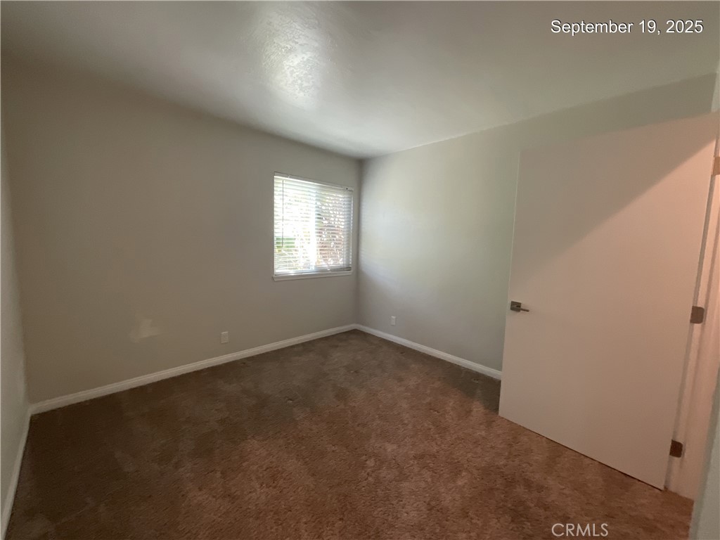 34021 Granada Drive, Unit B Dana Point, CA 92629 - Photo 22 of 23 an empty room with windows
