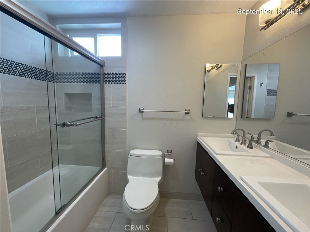 34021 Granada Drive, Unit B Dana Point, CA 92629 - Photo 9 of 23 a bathroom with a granite countertop sink toilet and shower