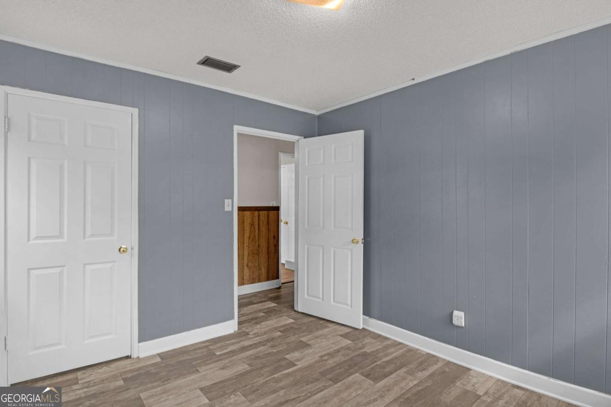 5837 Youmans Chapel Road Blackshear, GA 31516 - Photo 19 of 30 a view of an empty room