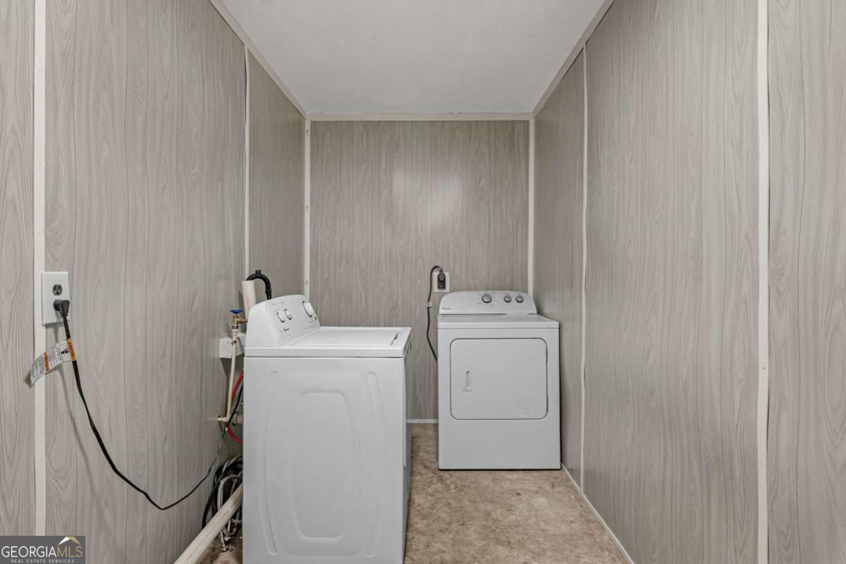 5837 Youmans Chapel Road Blackshear, GA 31516 - Photo 25 of 30 a utility room with dryer and washer