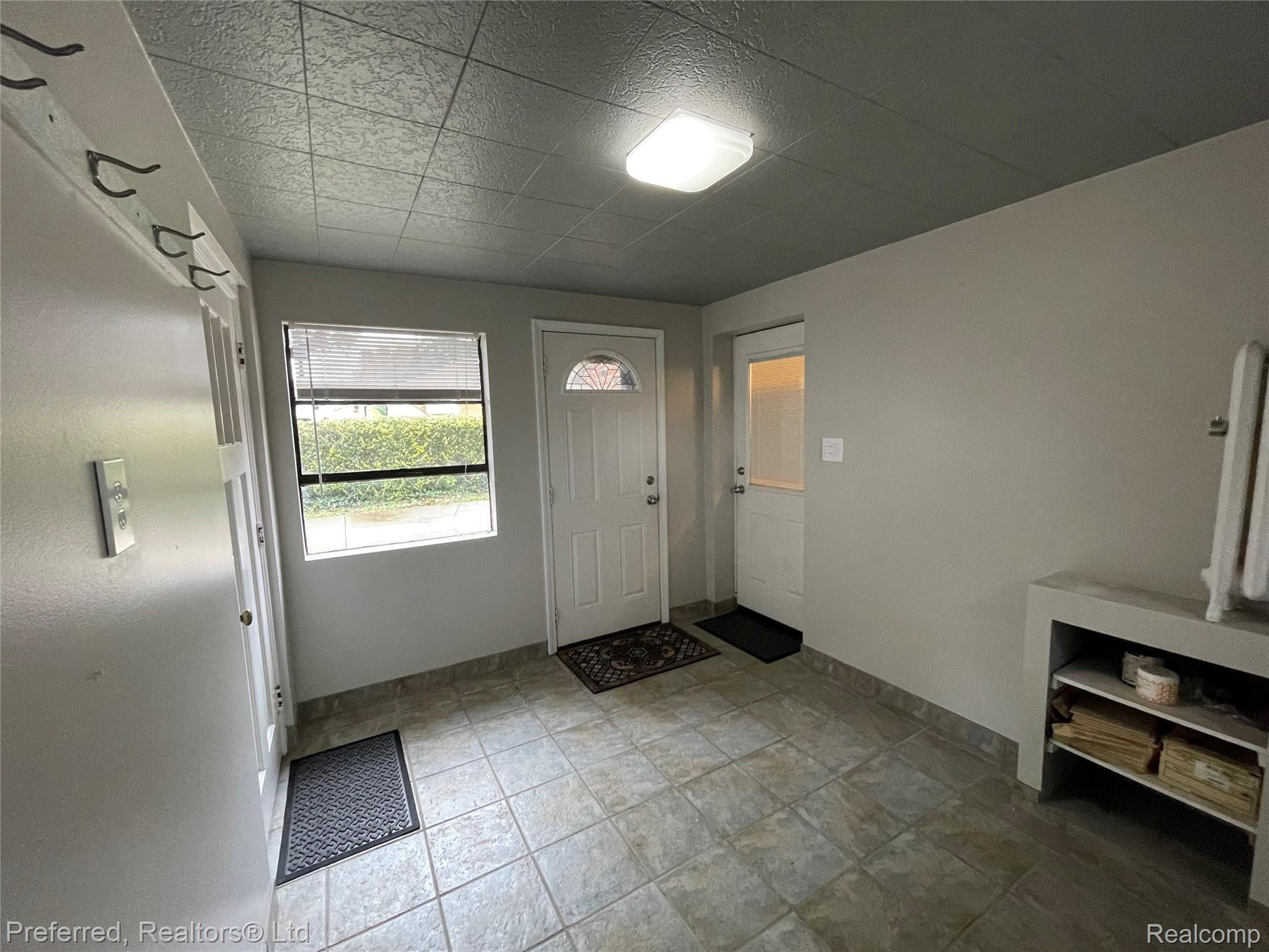 30200 Joy Road Livonia, MI 48150 - Photo 27 of 30 Breezeway from garage to main house. Great mud room!