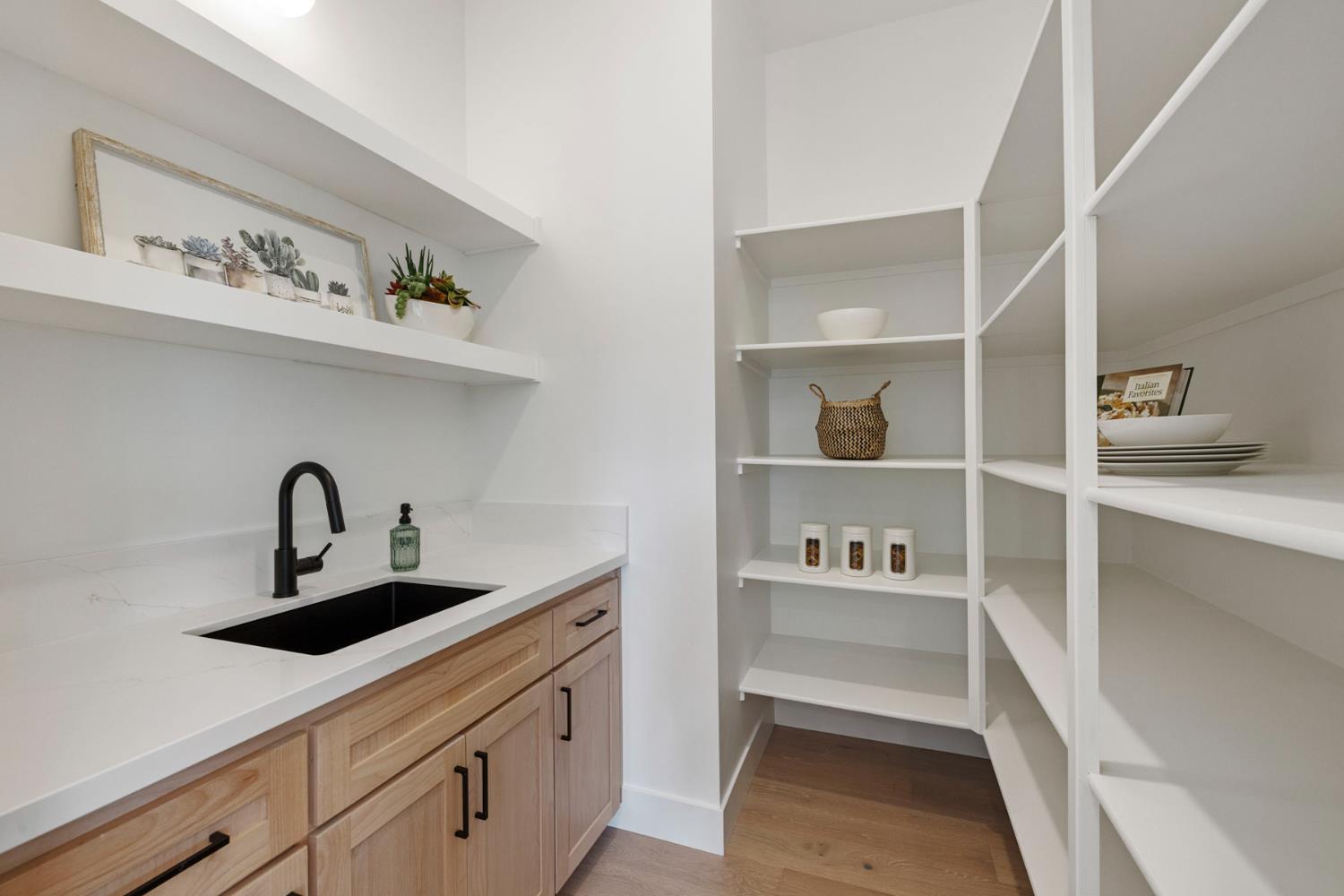 1510 Mission Avenue Carmichael, CA 95608 - Photo 17 of 60 a kitchen with a sink and a refrigerator