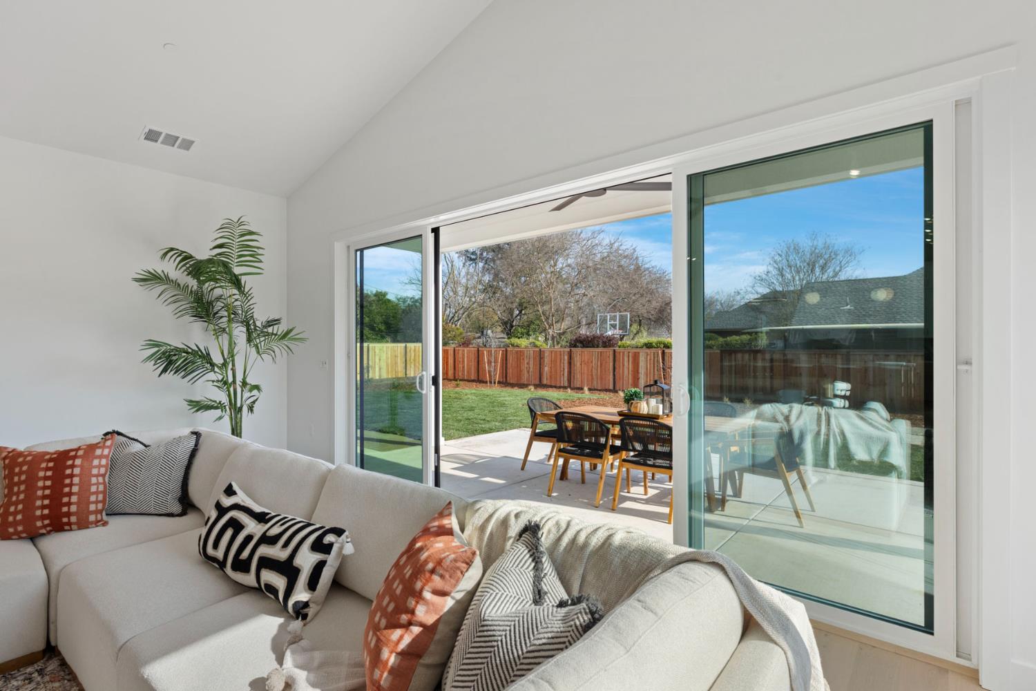 1510 Mission Avenue Carmichael, CA 95608 - Photo 23 of 60 a living room with furniture and a floor to ceiling window