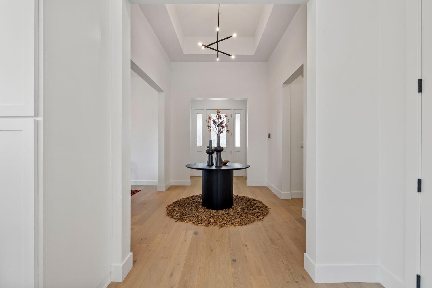 1510 Mission Avenue Carmichael, CA 95608 - Photo 38 of 60 a view of a hallway with a dining table & chairs