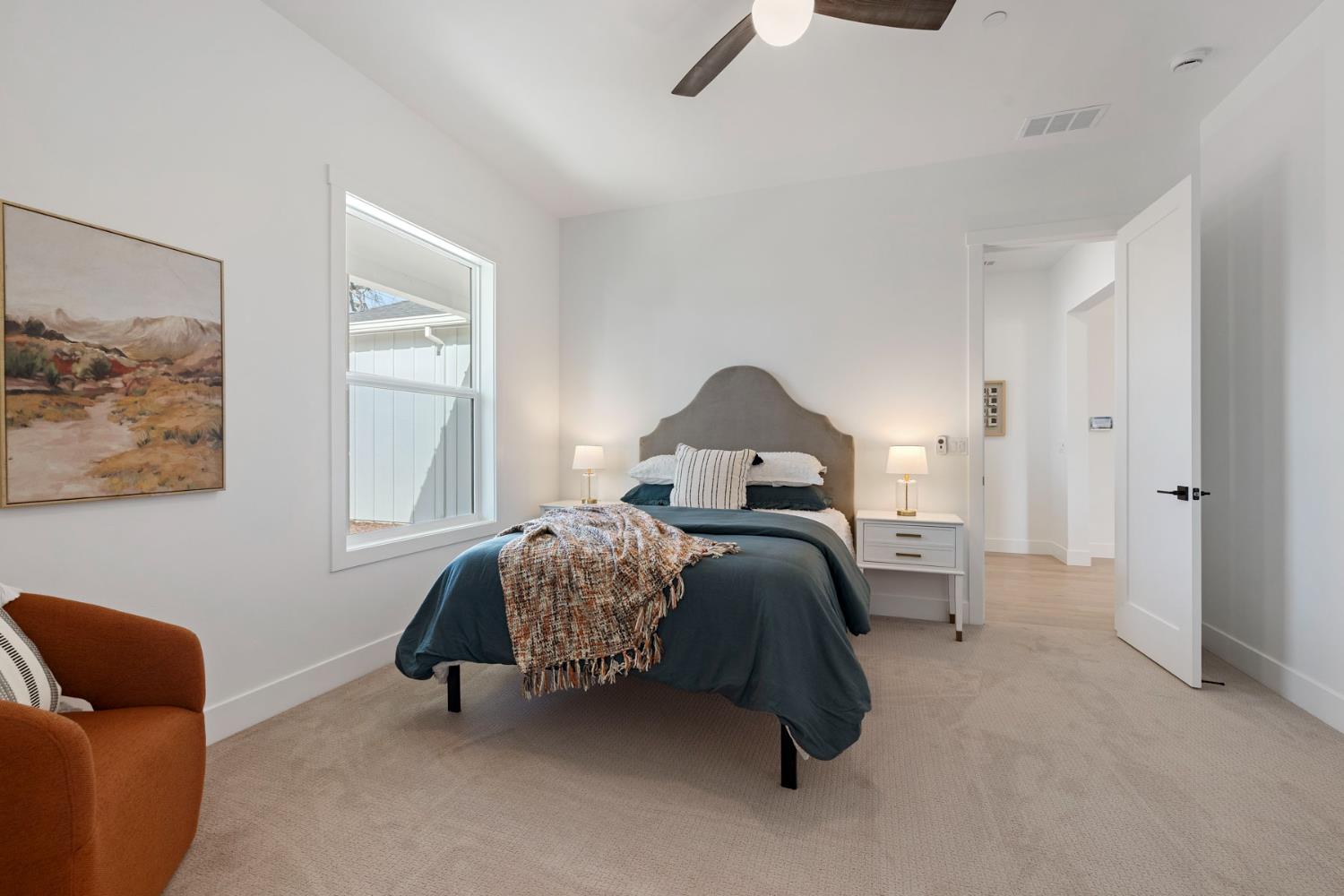 1510 Mission Avenue Carmichael, CA 95608 - Photo 40 of 60 a bedroom with a bed and a couch