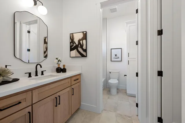 a kitchen with a sink and a stove