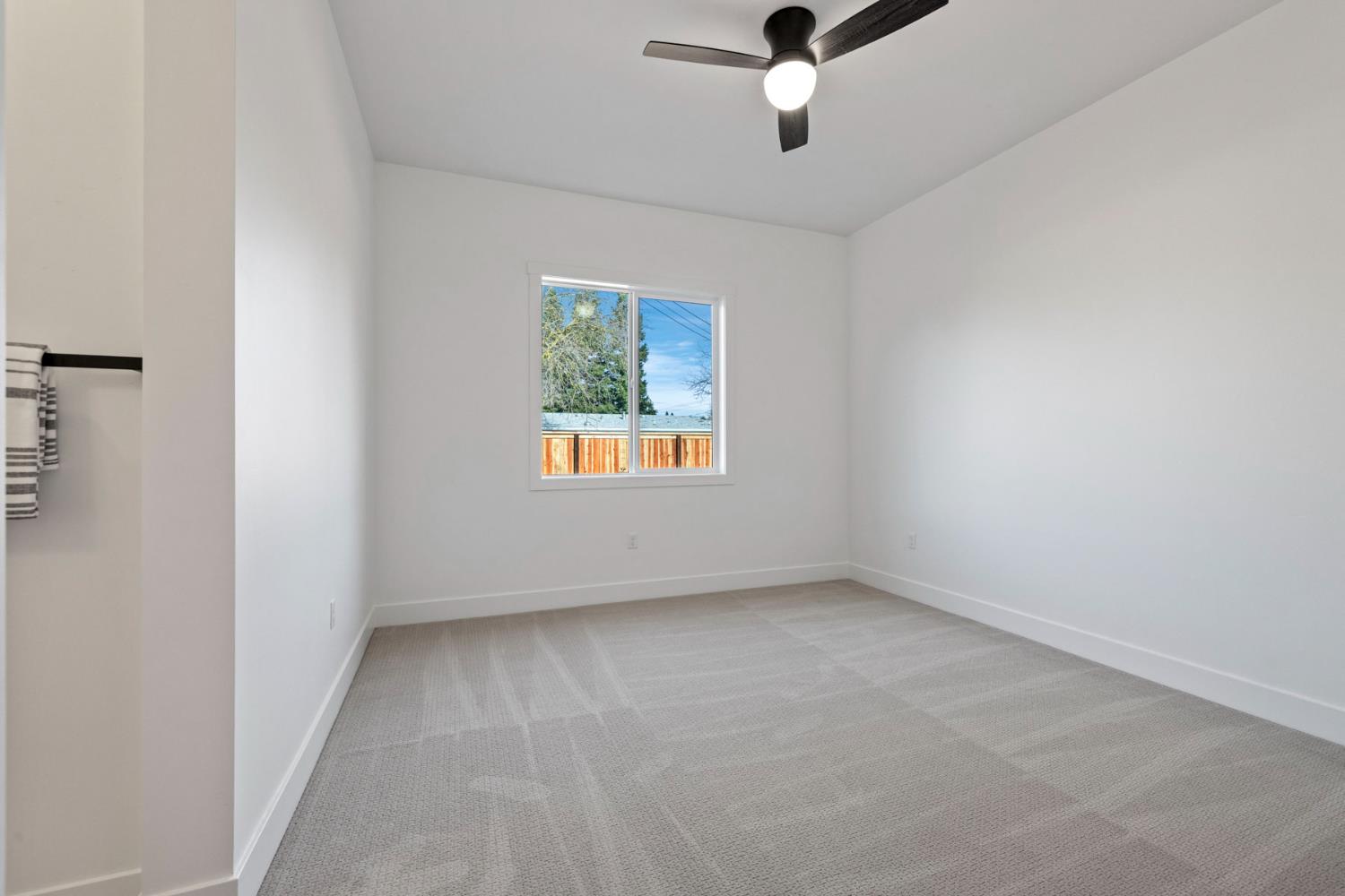 1510 Mission Avenue Carmichael, CA 95608 - Photo 47 of 60 an empty room with windows and fan