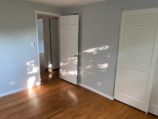 3420 Winnetka Road Glenview, IL 60026 - Photo 12 of 26 a view of a room with wooden floor