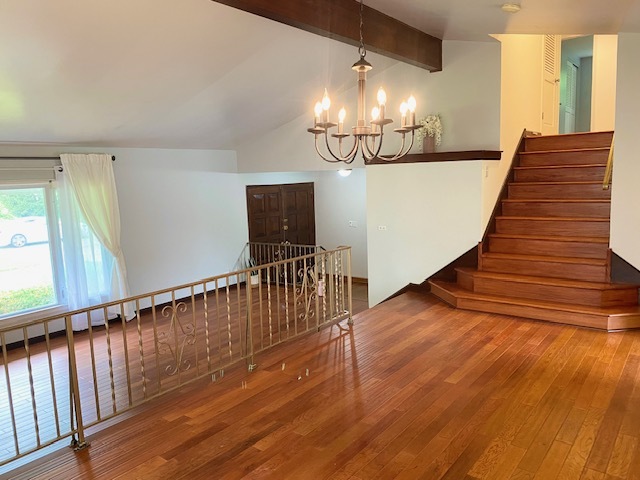 3420 Winnetka Road Glenview, IL 60026 - Photo 8 of 26 a view of entryway and hall with wooden floor