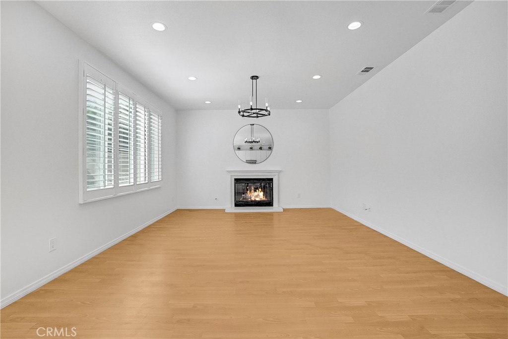 76 Millbrook Irvine, CA 92618 - Photo 16 of 51 a view of an empty room with a window