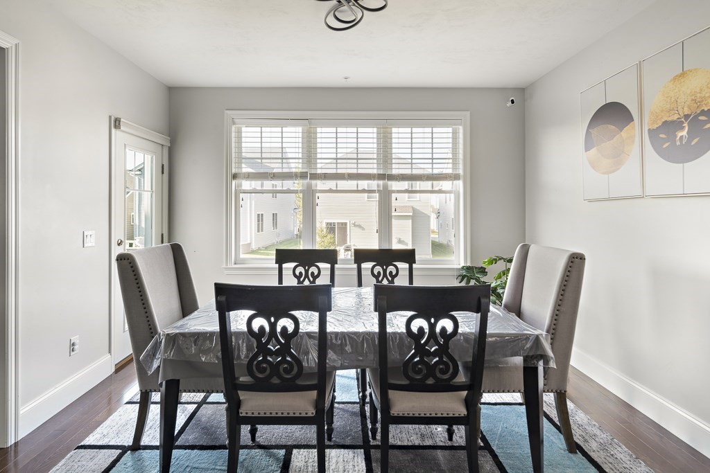 25 Oxbow Road, Unit 25 Framingham, MA 01701 - Photo 12 of 34 a view of a dining room with furniture window and outside view