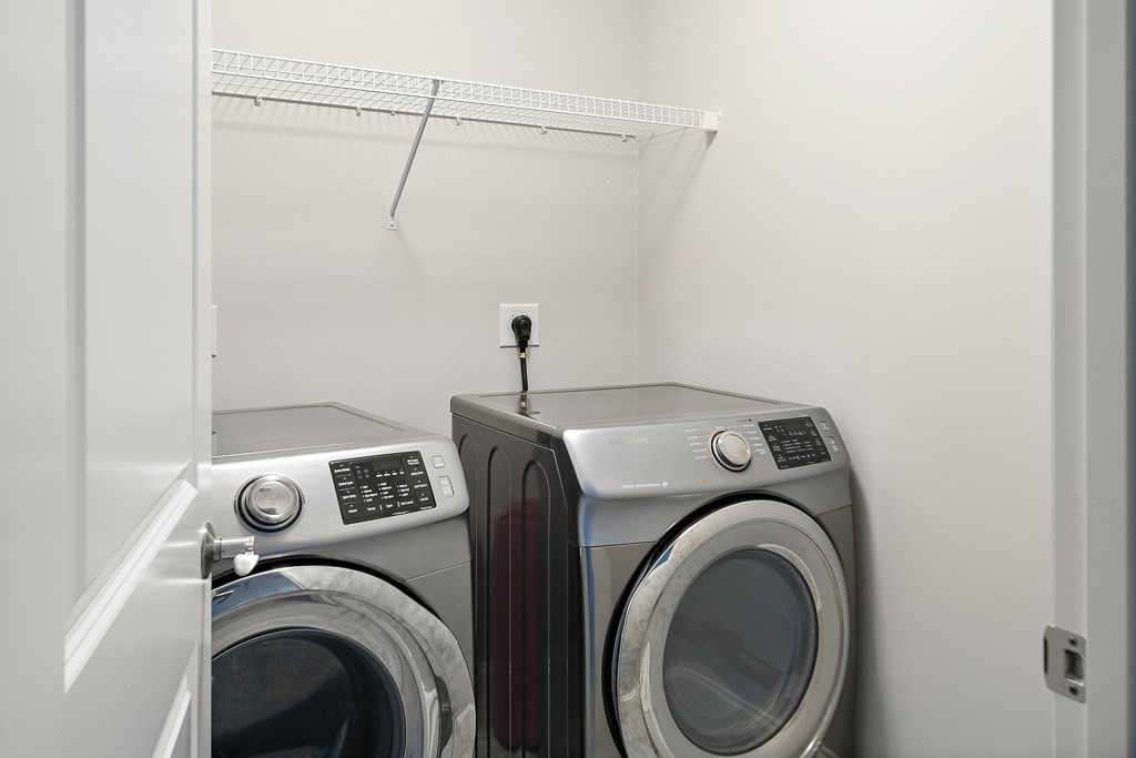 25 Oxbow Road, Unit 25 Framingham, MA 01701 - Photo 22 of 34 a utility room with dryer and washer
