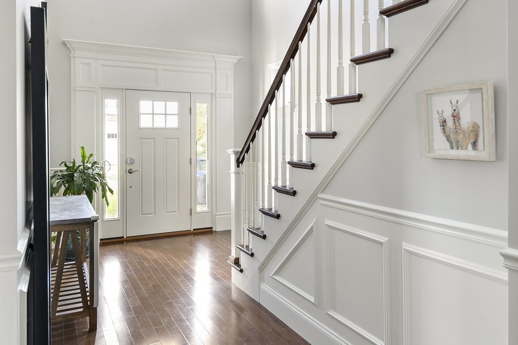 25 Oxbow Road, Unit 25 Framingham, MA 01701 - Photo 4 of 34 a view of entryway with wooden floor and stairs
