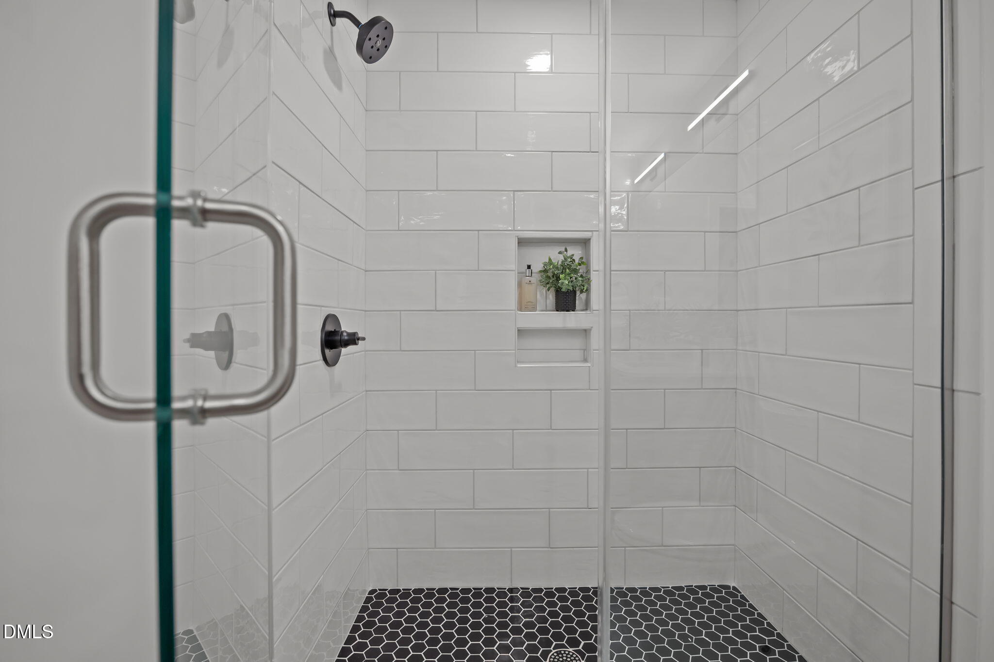 615 West Peace Street, Unit 202 Raleigh, NC 27603 - Photo 18 of 24 a bathroom with a shower