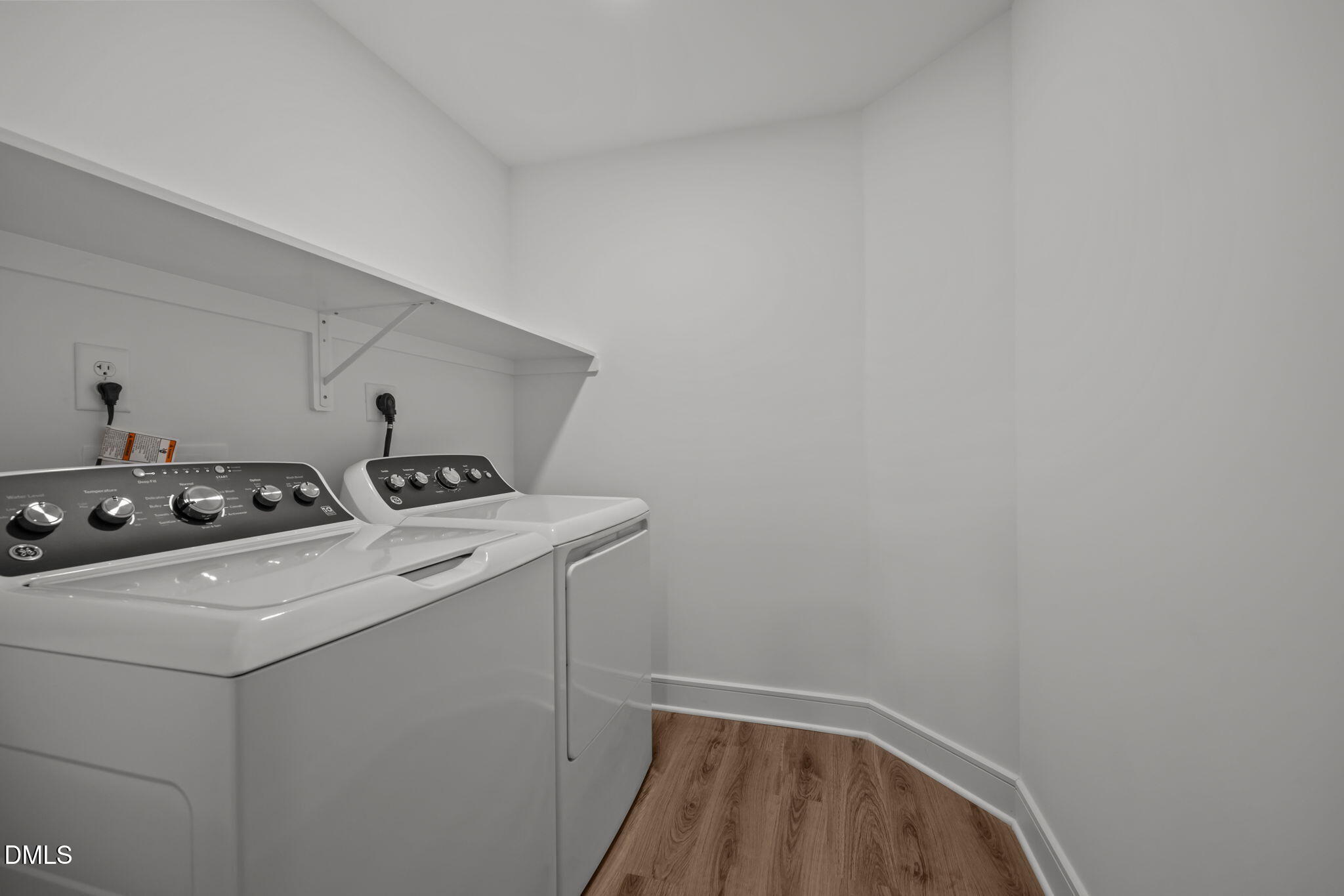 615 West Peace Street, Unit 202 Raleigh, NC 27603 - Photo 19 of 24 a utility room with dryer and washer