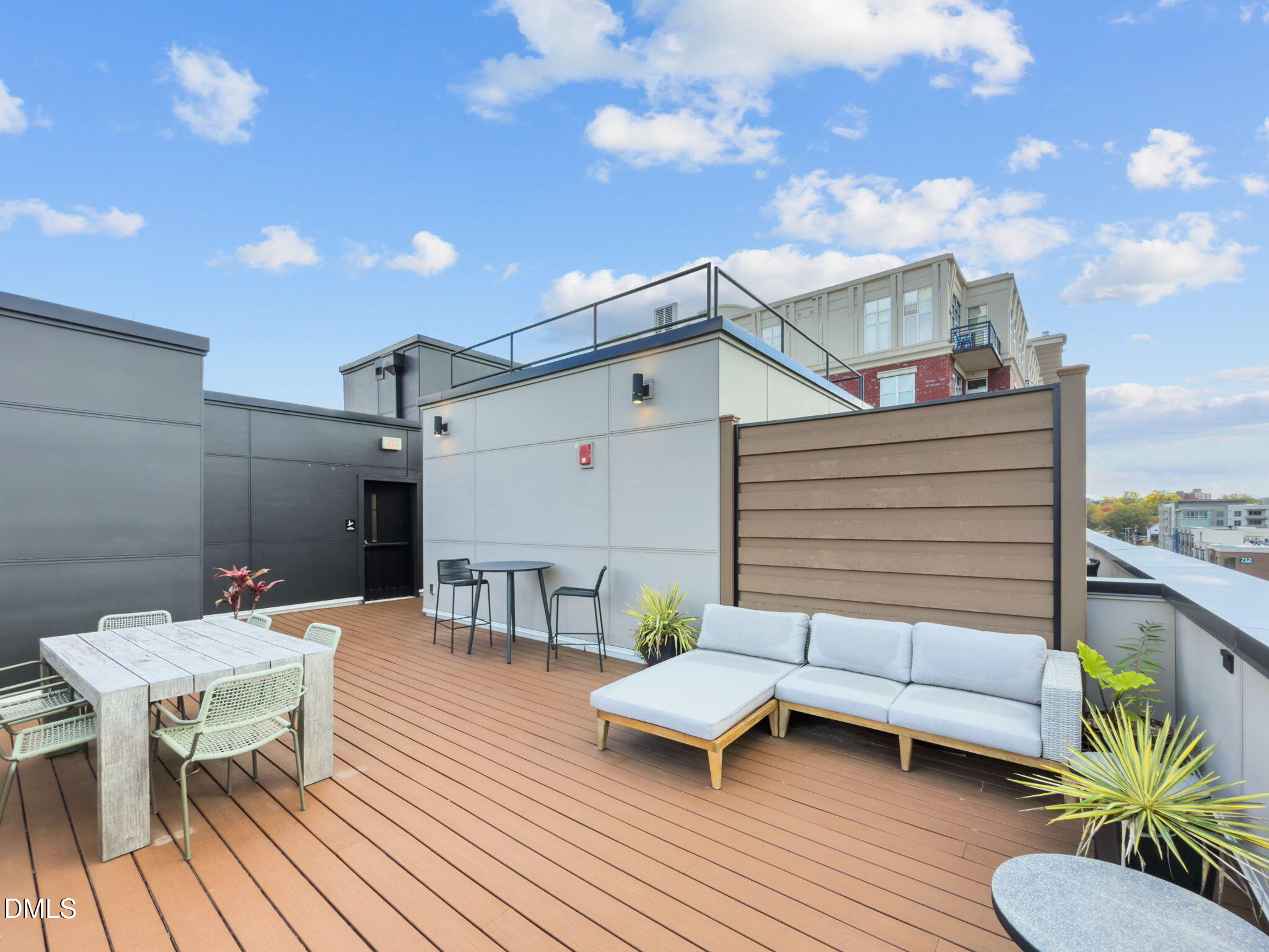 615 West Peace Street, Unit 202 Raleigh, NC 27603 - Photo 20 of 24 a view of a terrace with furniture