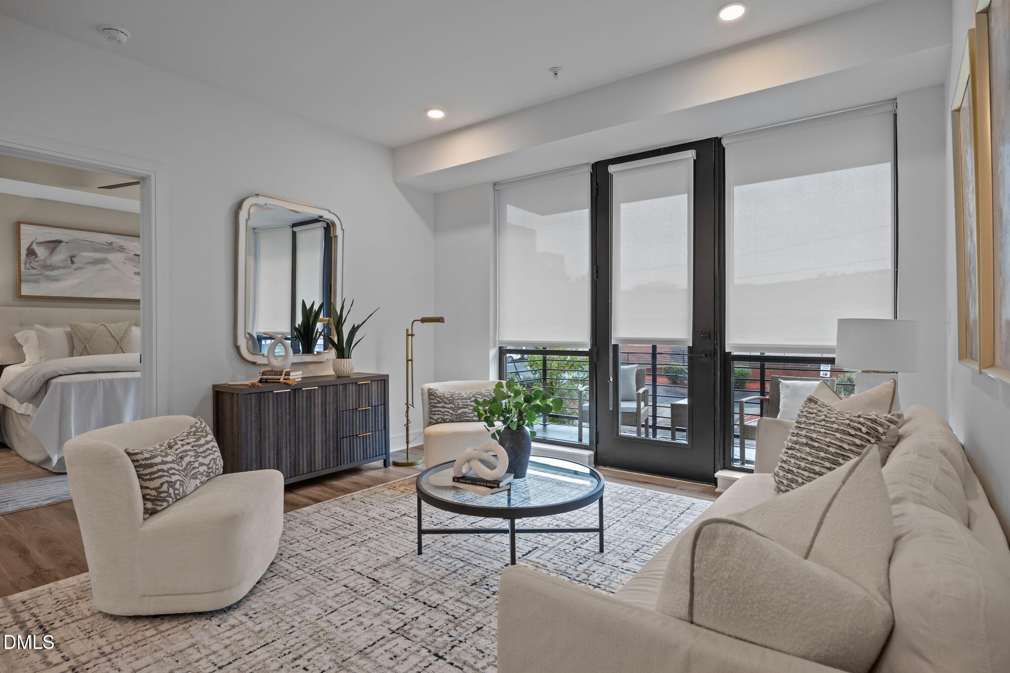 615 West Peace Street, Unit 202 Raleigh, NC 27603 - Photo 7 of 24 a living room with furniture and a large window