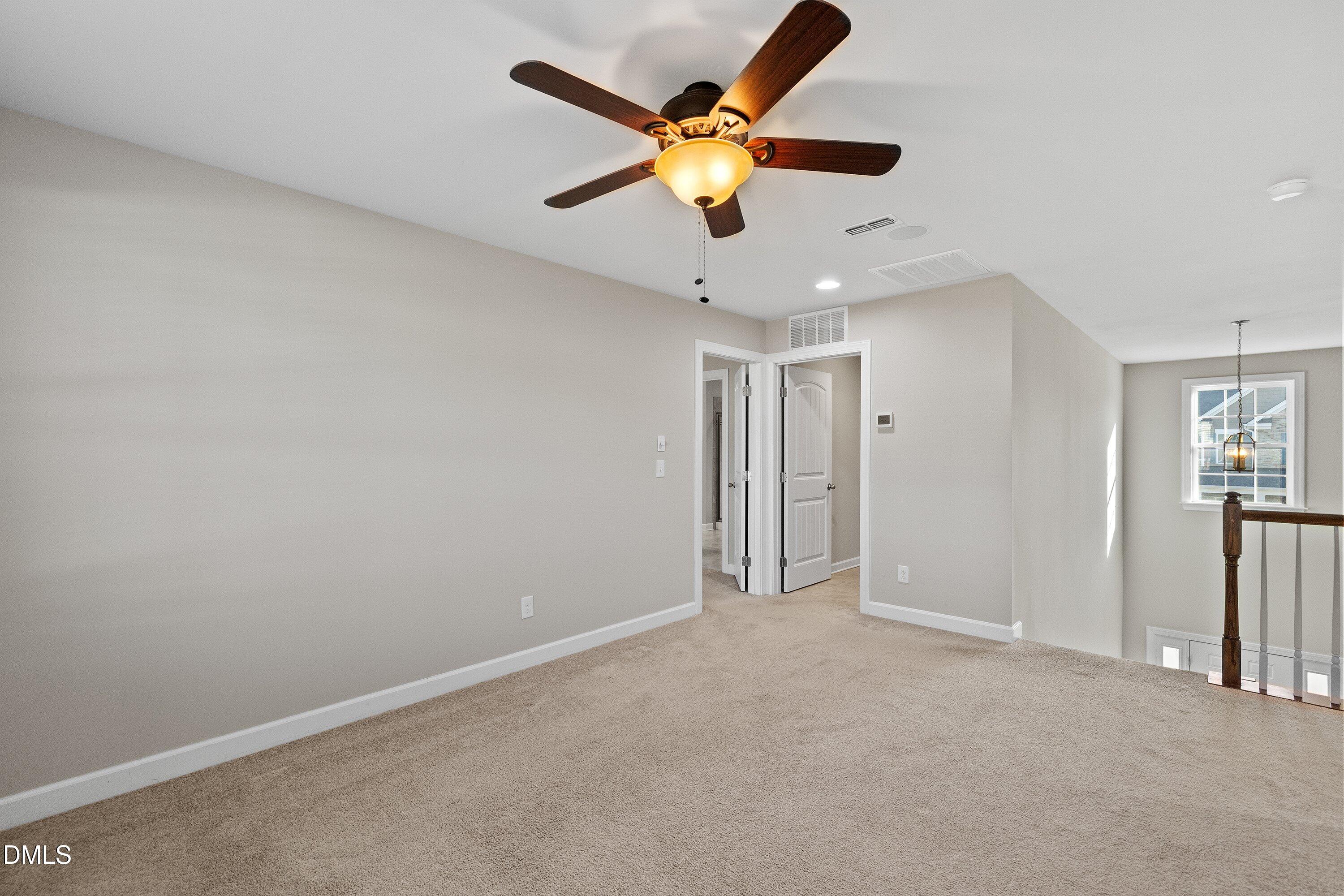 721 Maple Brook Road Fuquay-Varina, NC 27526 - Photo 26 of 59 Alternate view of Loft shows flow of the rooms.