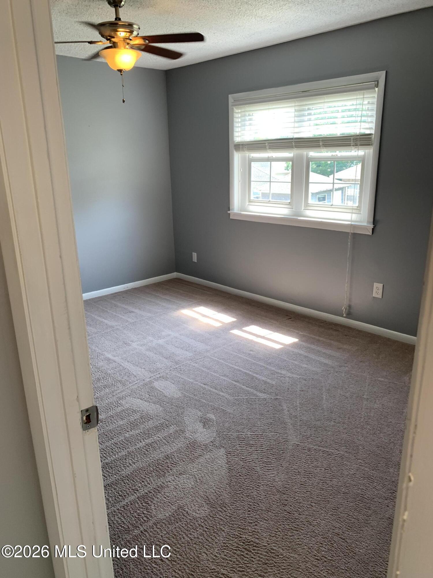 928 Courthouse Road, Unit 38 Gulfport, MS 39507 - Photo 15 of 21 Guest Bedroom Upstairs
