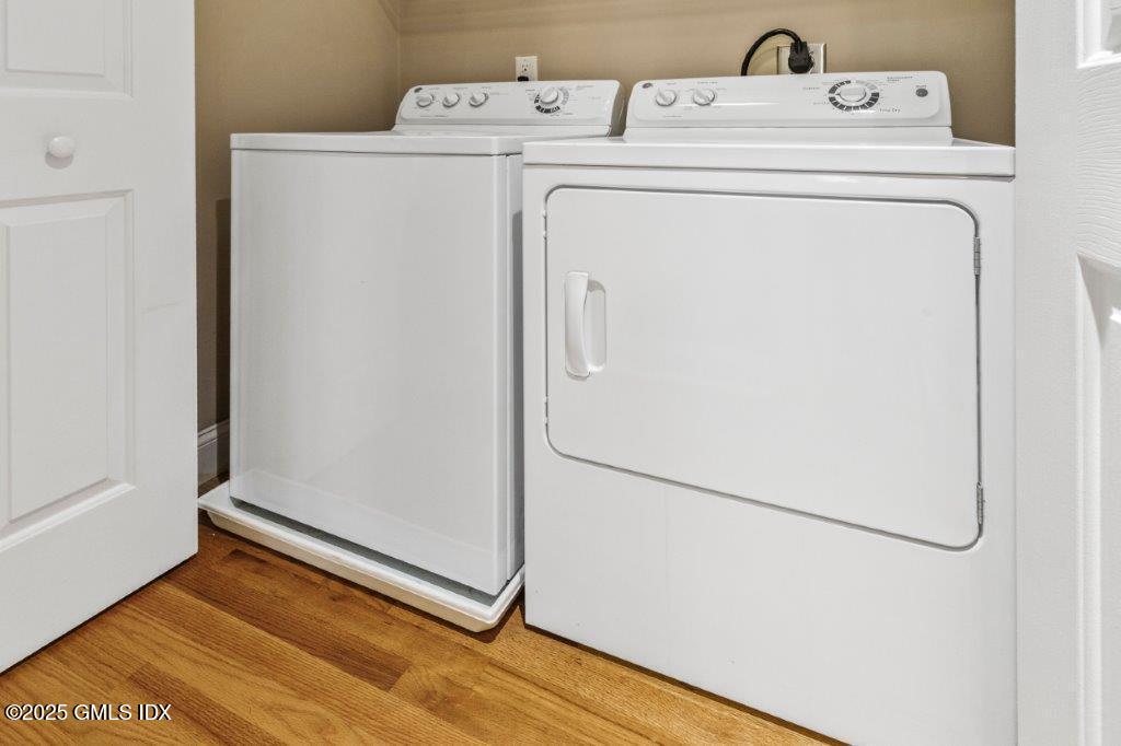 18 Charles Street, Unit B Greenwich, CT 06830 - Photo 14 of 14 a utility room with dryer and washer