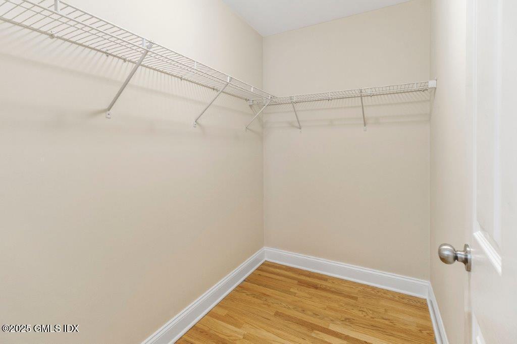 18 Charles Street, Unit B Greenwich, CT 06830 - Photo 8 of 14 a view of a room with racks on the wall