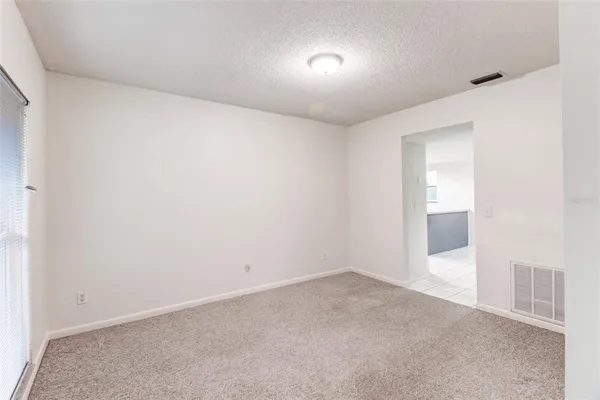 an empty room with an entryway