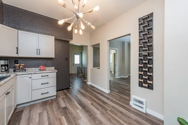 a view of a hallway with washer and dryer
