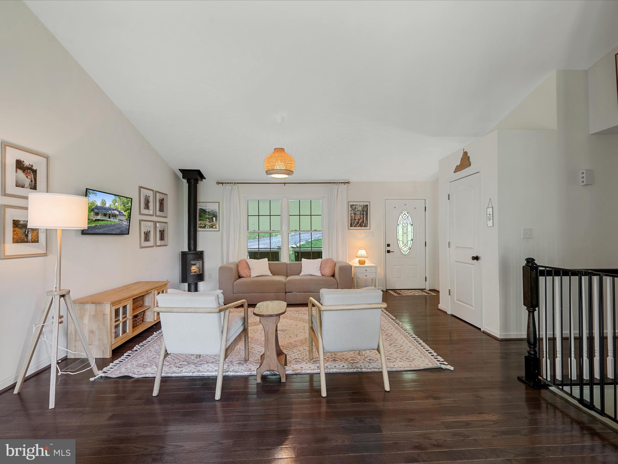 439 Windy Way Front Royal, VA 22630 - Photo 16 of 40 a living room with fireplace furniture and a wooden floor