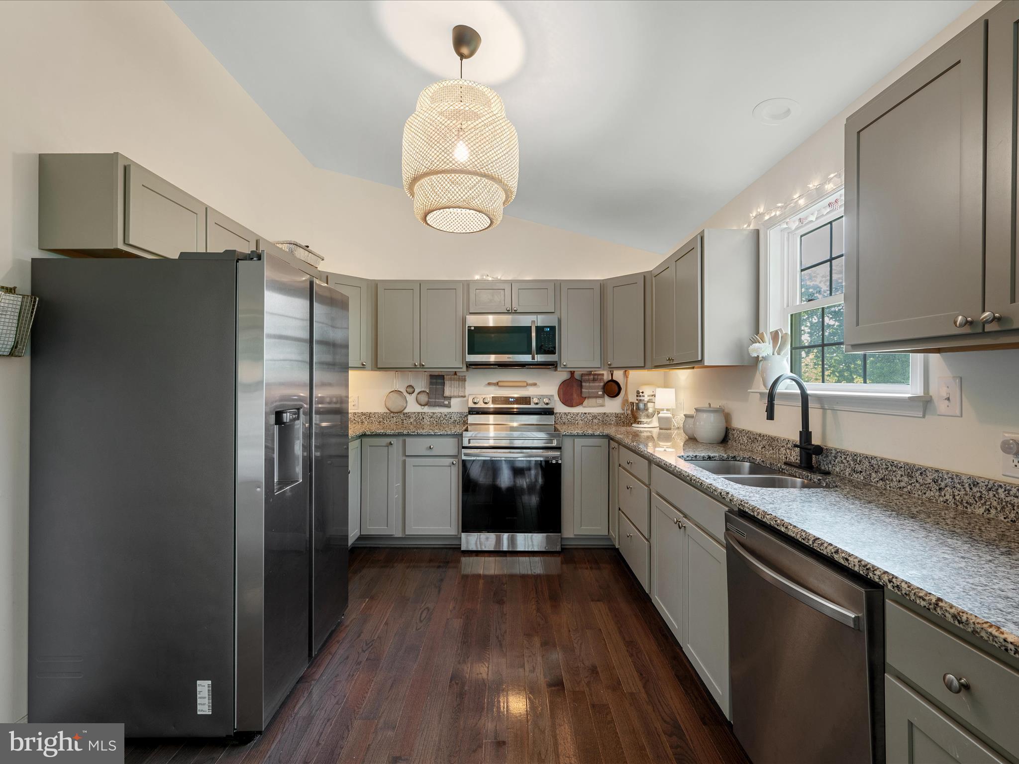 439 Windy Way Front Royal, VA 22630 - Photo 17 of 40 a kitchen with a sink stainless steel appliances and cabinets