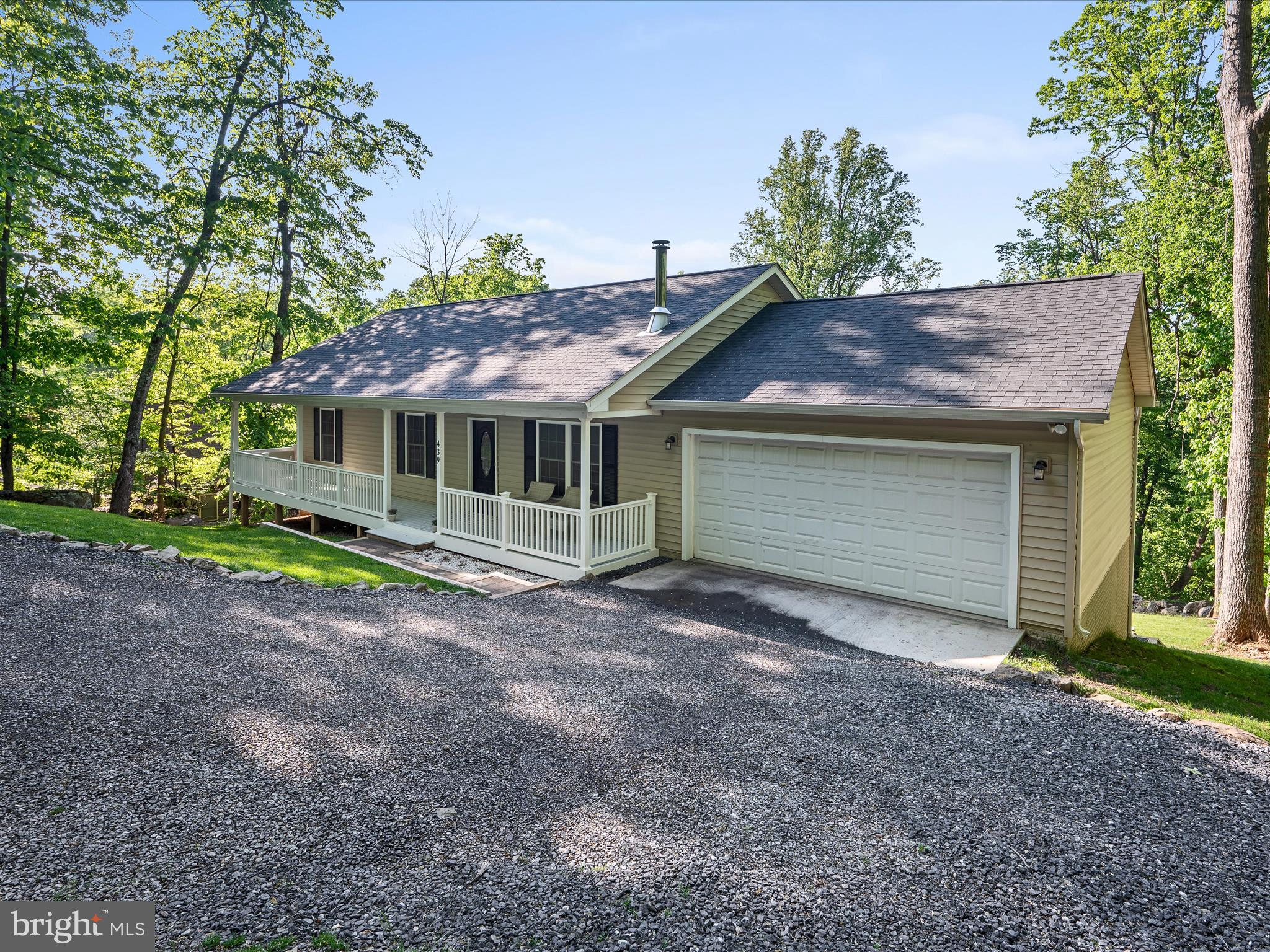 439 Windy Way Front Royal, VA 22630 - Photo 2 of 40 a view of a house with a yard and large tree