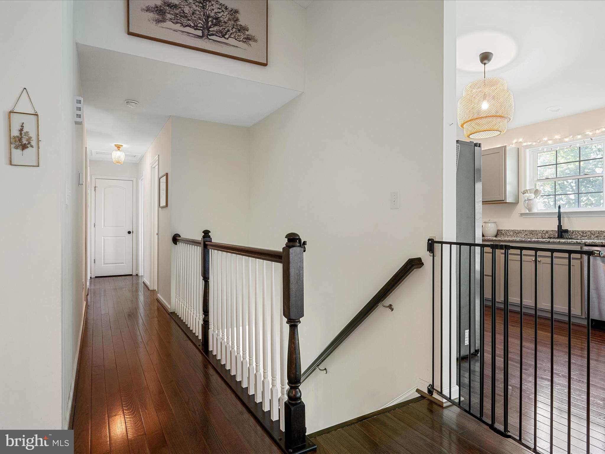 439 Windy Way Front Royal, VA 22630 - Photo 28 of 40 a view of a hallway with wooden floor and stairs