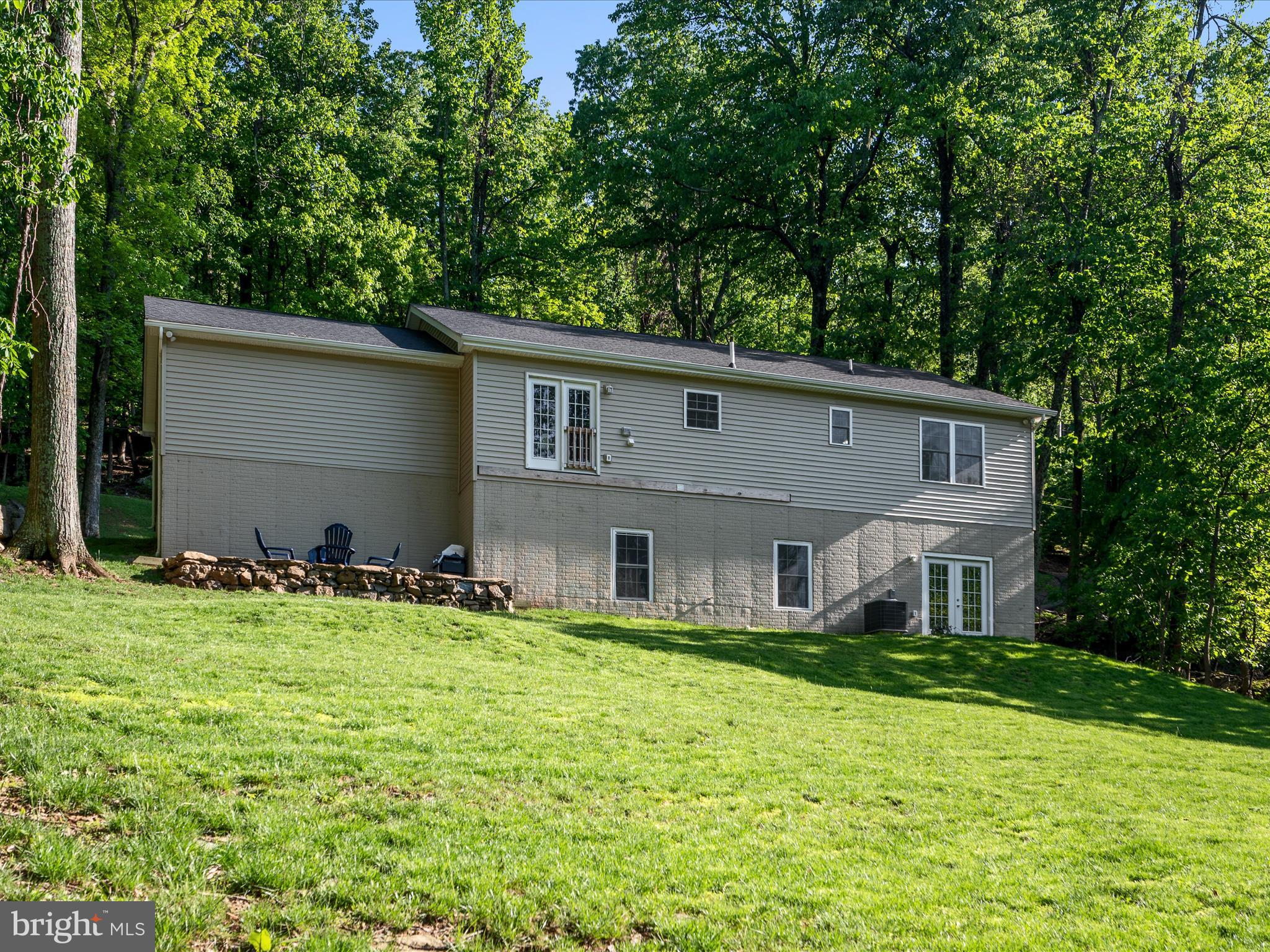 439 Windy Way Front Royal, VA 22630 - Photo 32 of 40 a front view of house with yard and green space