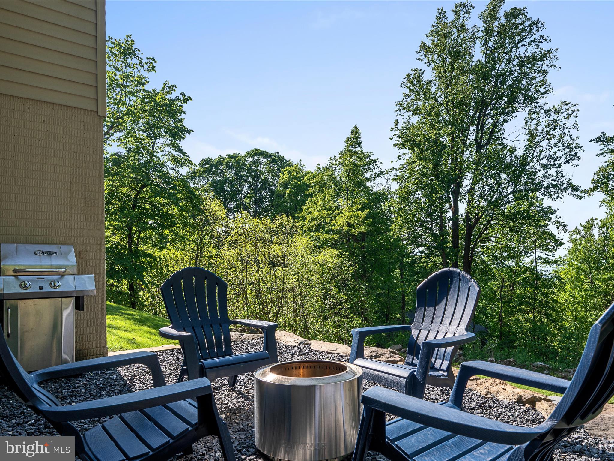 439 Windy Way Front Royal, VA 22630 - Photo 5 of 40 a backyard of a house with outdoor seating